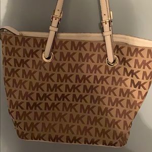 Michael Korda logo purse